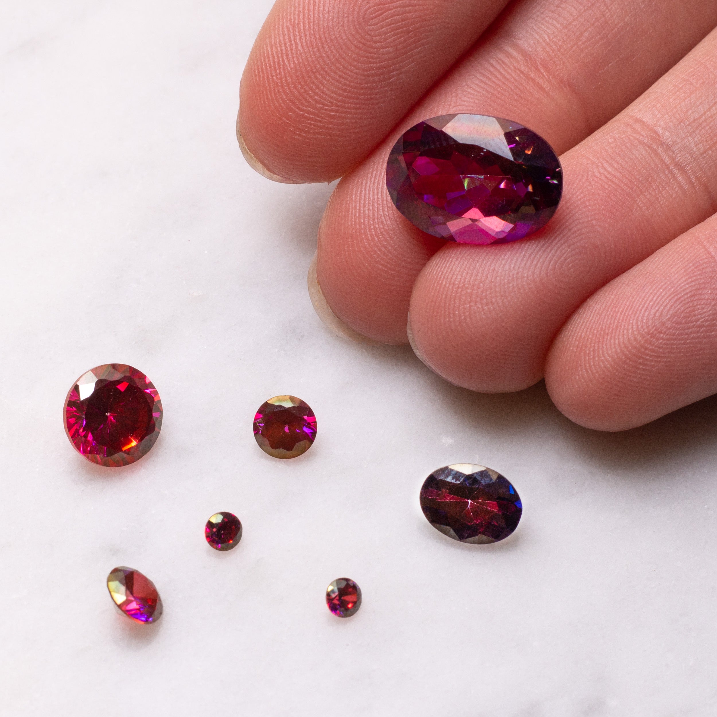 Magenta Glow Cubic Zirconia Faceted Stones
