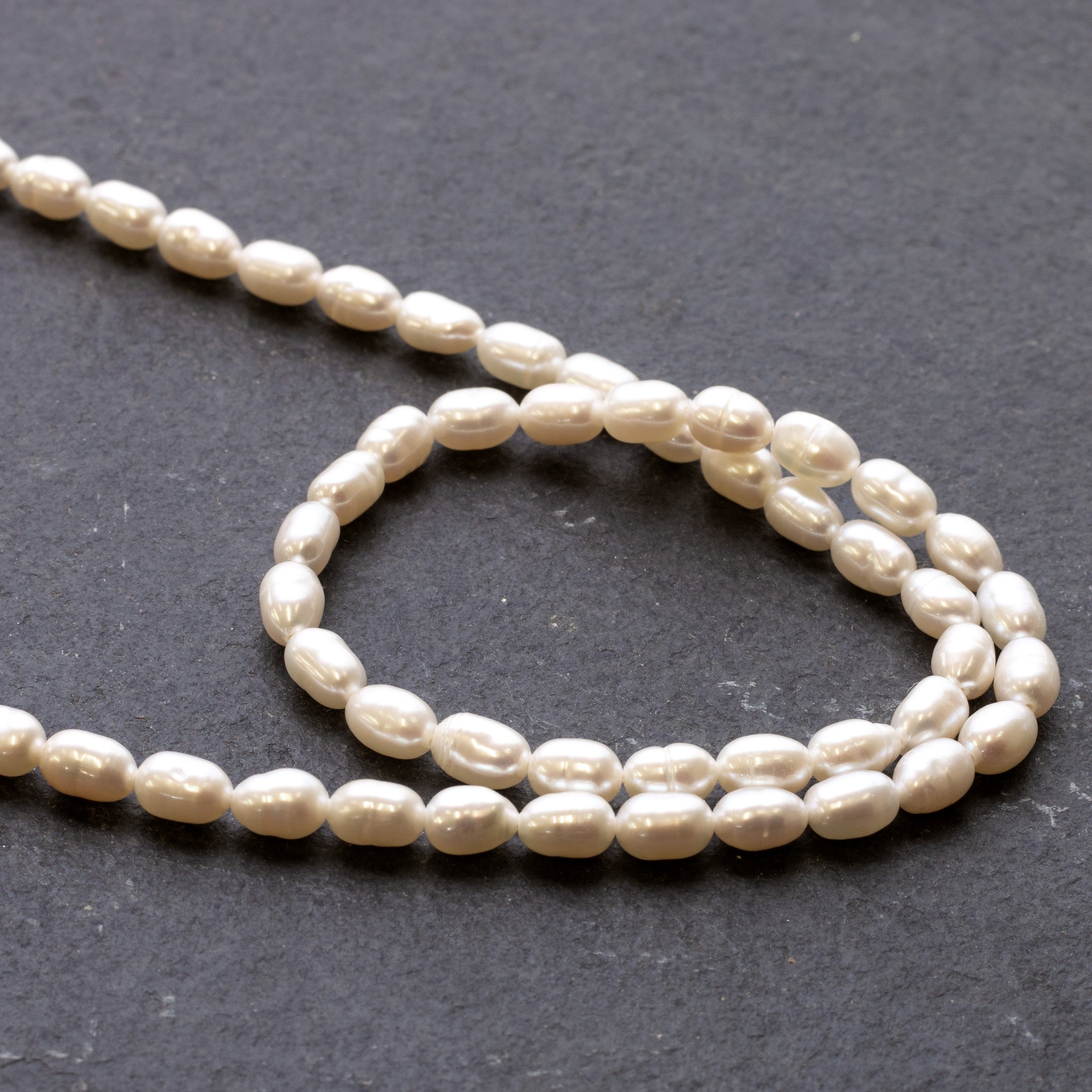 Cultured Freshwater Rice Shaped White Pearls Approx 6x5mm