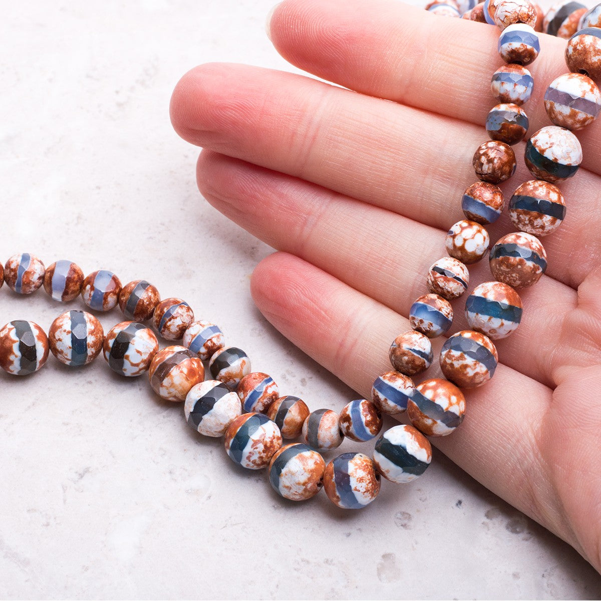 Tibetan Patterned Faceted Agate Round Beads