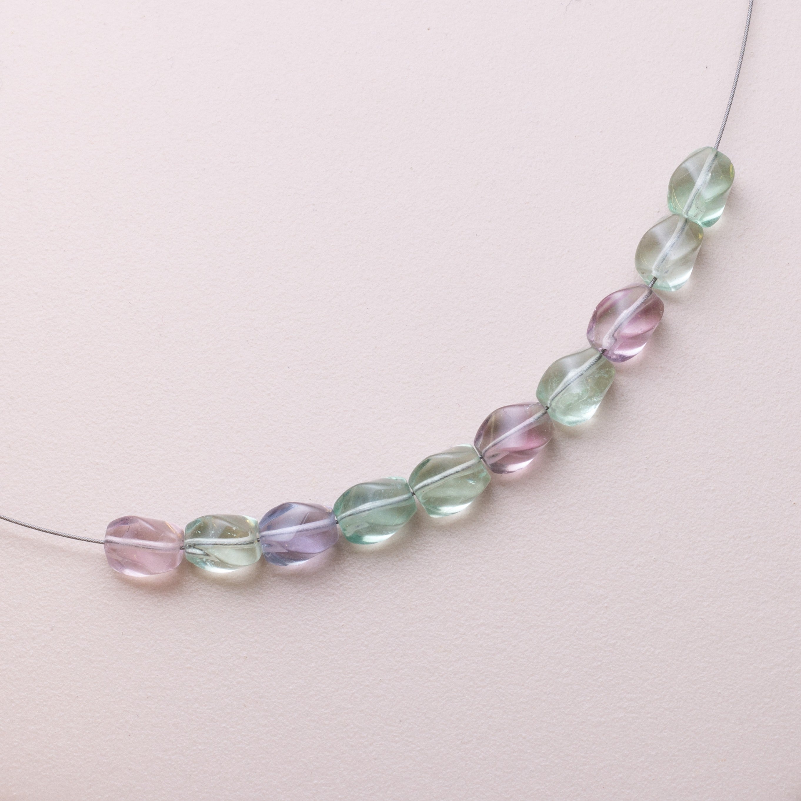 Rainbow Fluorite Twisted Beads Approx 8x6mm