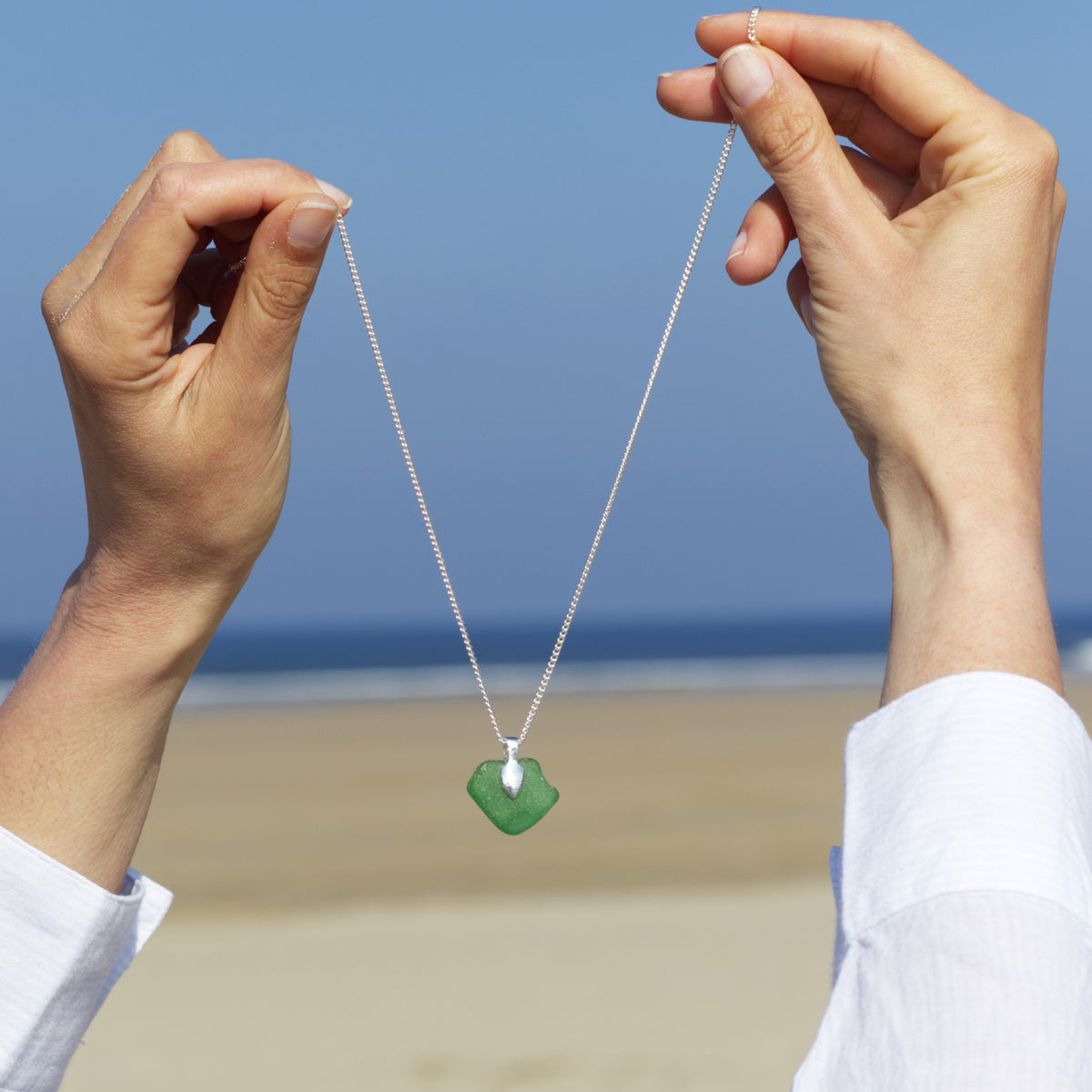 Green sea glass pendant necklace made using the Beginner's Sea Glass Jewellery Making Kit