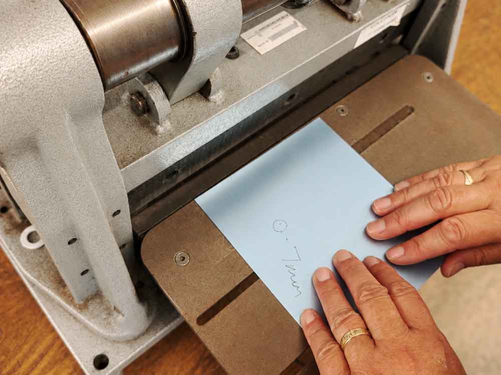Sterling silver being carefully hand measured before cutting to order
