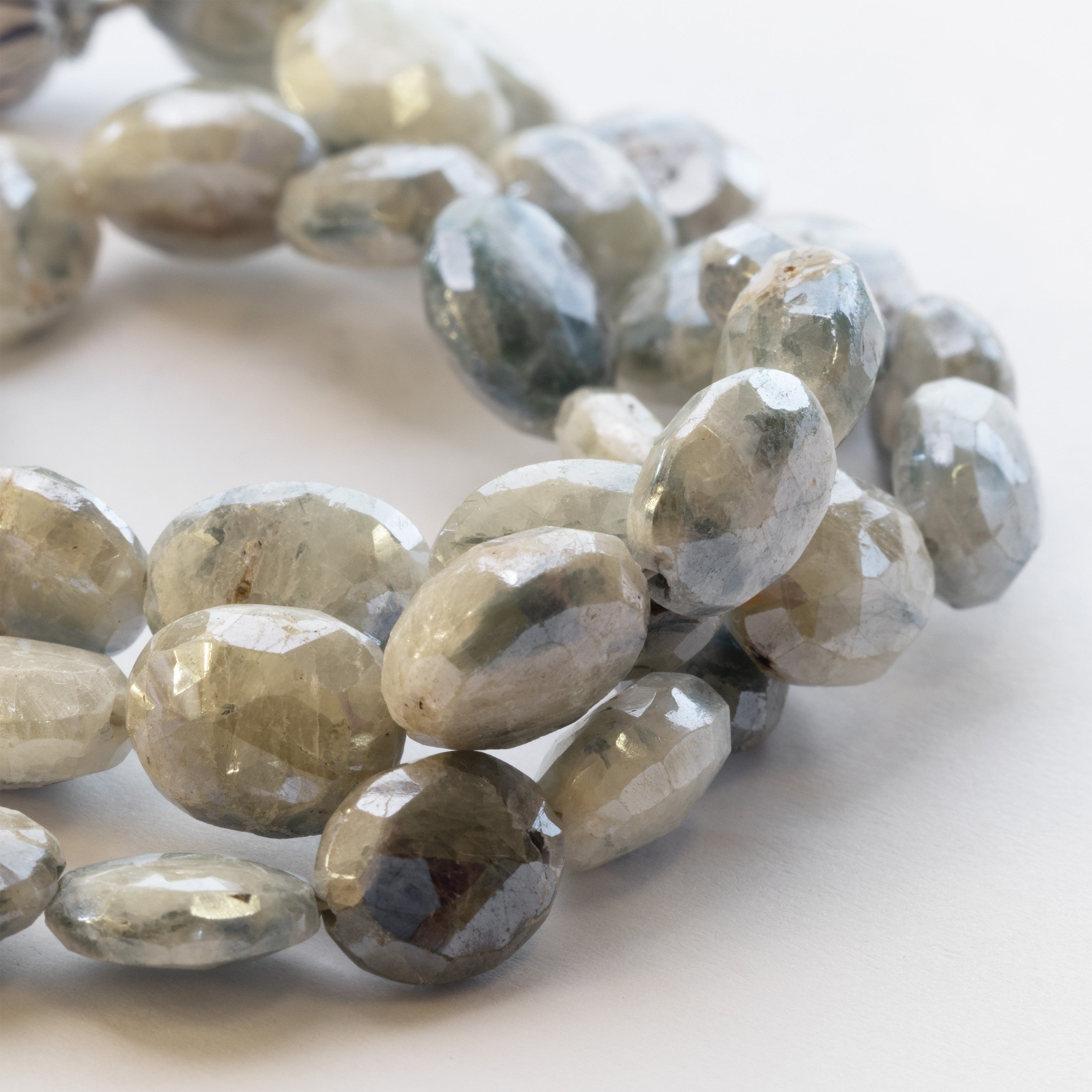 Mystic Coated Faceted Quartz Oval Beads Approx 9mm