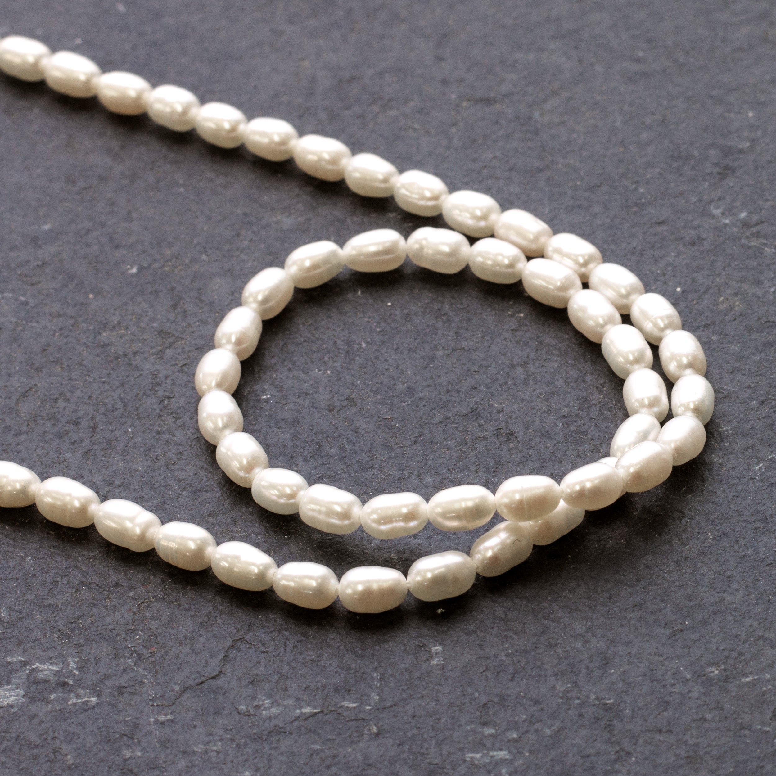 Cultured Freshwater Rice Shaped White Pearls Approx 3.5mm pk10 Beads