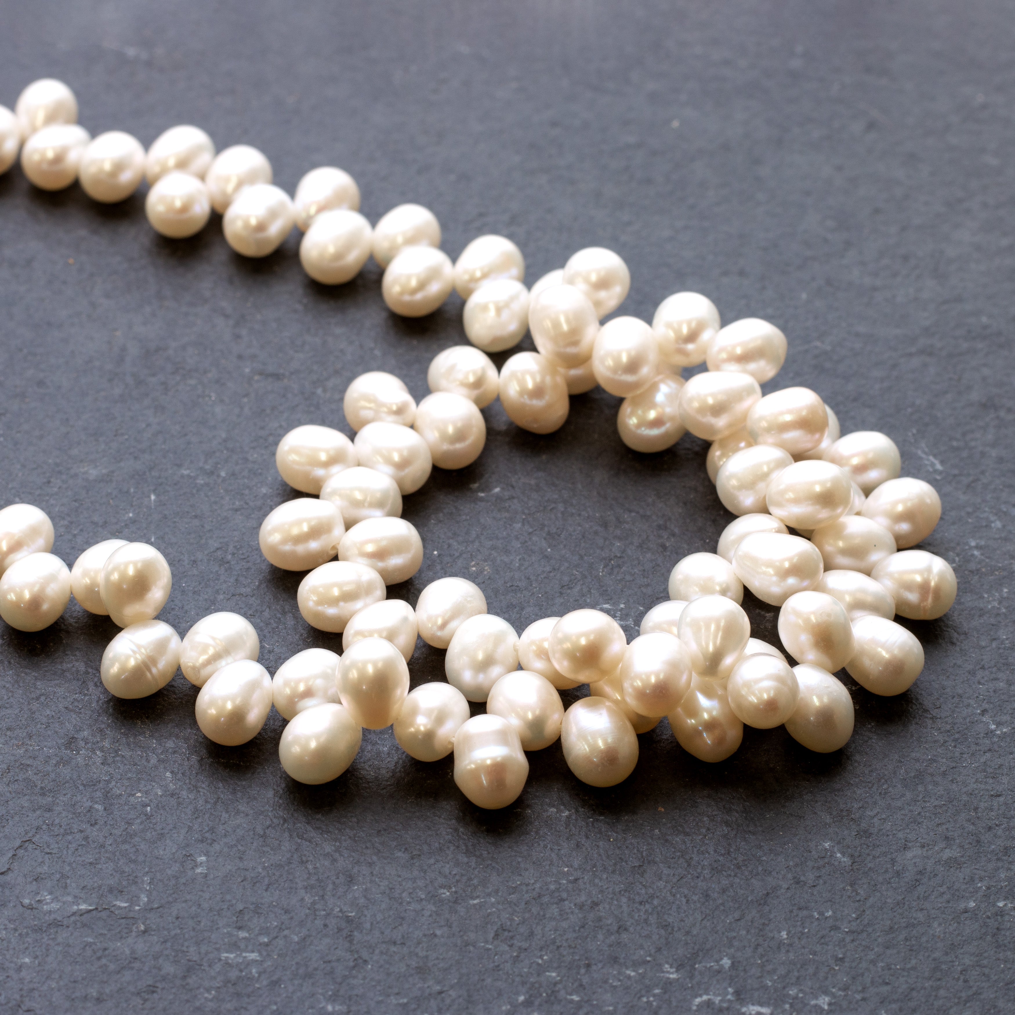 Cultured Freshwater Head Drilled Teardrop Shaped White Pearl Approx 7x6mm