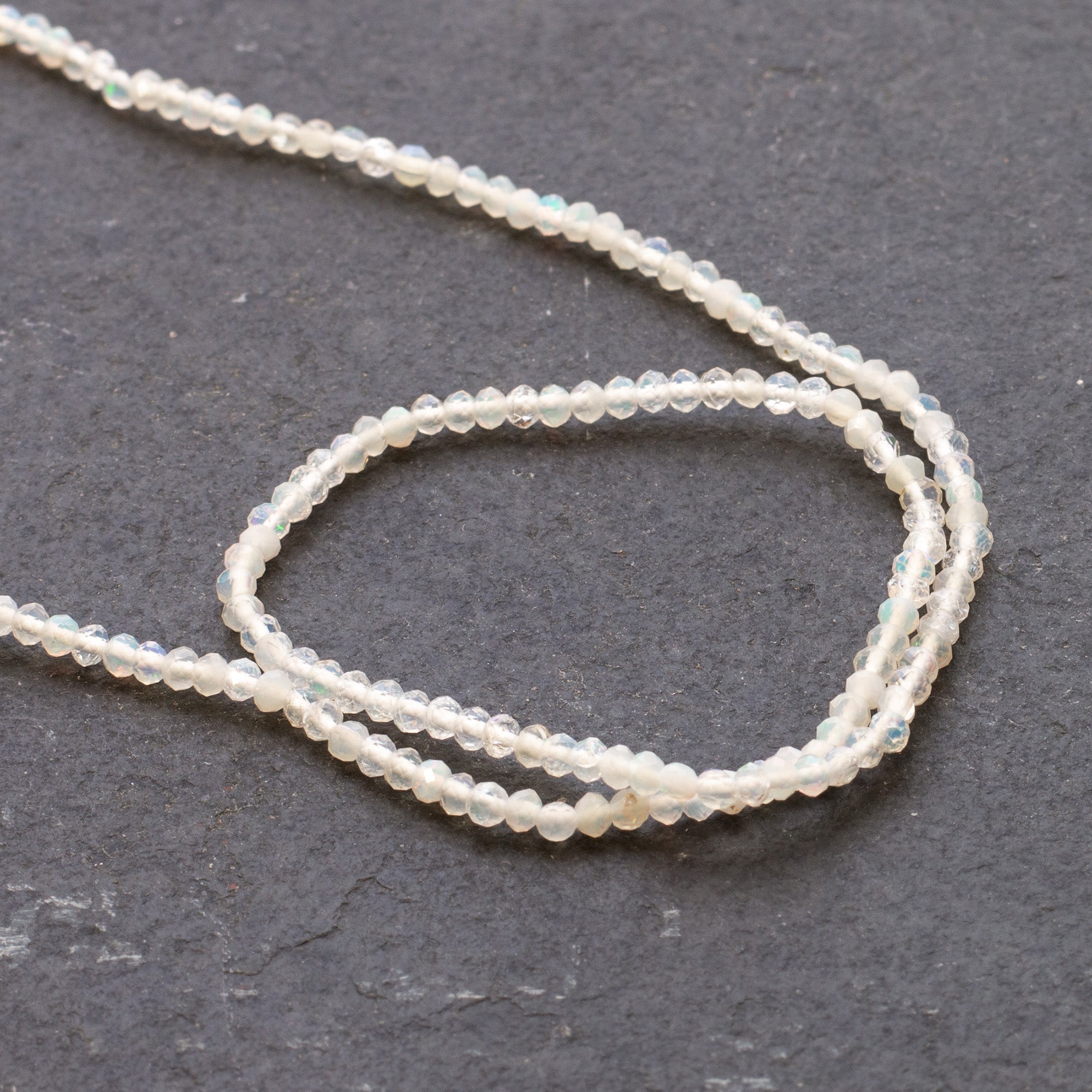 Ethiopian Opal Micro Faceted Rondelle Beads Approx 2x1.5mm